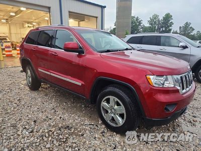 Czwarte zdjęcie samochodu z boku: 2012 JEEP GRAND CHEROKEE LAREDO VIN:1C4RJFAG2CC224912 - miniatura