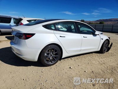 Trzecie zdjęcie samochodu z tyłu: 2023 TESLA MODEL 3 VIN:5YJ3E1EA9PF612022 - miniatura