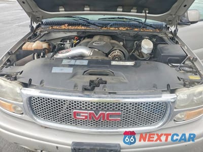 Zdjęcie 12 z 13 samochodu: 2004 GMC YUKON XL DENALI VIN:1GKFK66U64J166691 - miniatura