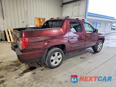 Trzecie zdjęcie samochodu z tyłu: 2009 HONDA RIDGELINE RTL VIN:2HJYK16519H500565 - miniatura