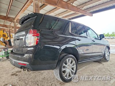 Trzecie zdjęcie samochodu z tyłu: 2022 CHEVROLET TAHOE C1500 HIGH COUNTRY VIN:1GNSCTKL8NR155527 - miniatura