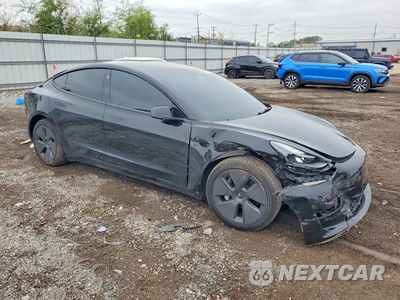 Czwarte zdjęcie samochodu z boku: 2022 TESLA MODEL 3 VIN:5YJ3E1EB9NF117096 - miniatura