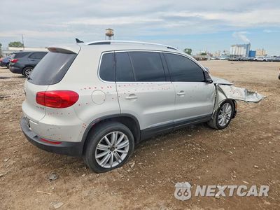 Trzecie zdjęcie samochodu z tyłu: 2012 VOLKSWAGEN TIGUAN S VIN:WVGAV7AX4CW511217 - miniatura