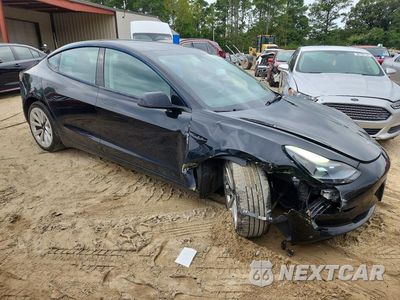 Czwarte zdjęcie samochodu z boku: 2022 TESLA MODEL 3 VIN:5YJ3E1EAXNF369284 - miniatura