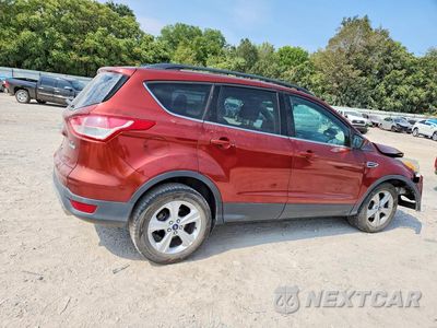 Trzecie zdjęcie samochodu z tyłu: 2014 FORD ESCAPE SE VIN:1FMCU0GX8EUB12447 - miniatura