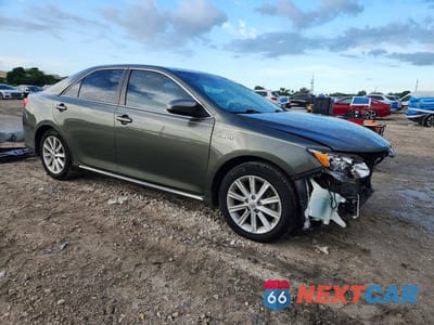 Czwarte zdjęcie samochodu z boku: 2012 TOYOTA CAMRY HYBRID XLE VIN:4T1BD1FK0CU037621 - miniatura