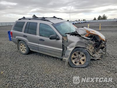 Czwarte zdjęcie samochodu z boku: 2001 JEEP GRAND CHEROKEE LAREDO VIN:1J4GW48SX1C661877 - miniatura