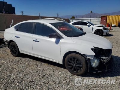Czwarte zdjęcie samochodu z boku: 2018 NISSAN SENTRA S VIN:3N1AB7AP4JY249527 - miniatura
