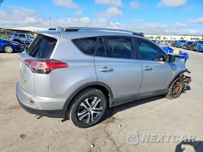 Trzecie zdjęcie samochodu z tyłu: 2018 TOYOTA RAV4 LE VIN:2T3ZFREV1JW416232 - miniatura