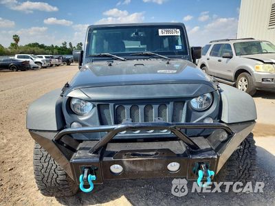 Piąte zdjęcie samochodu w środku: 2017 JEEP WRANGLER UNLIMITED SPORT VIN:1C4BJWDGXHL521236 - miniatura