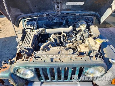Zdjęcie 11 z 12 samochodu: 2001 JEEP WRANGLER / TJ SPORT VIN:1J4FA49S61P338539 - miniatura