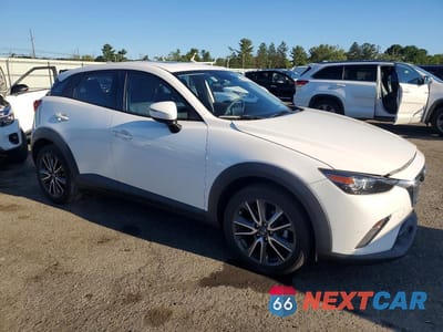 Czwarte zdjęcie samochodu z boku: 2017 MAZDA CX-3 TOURING VIN:JM1DKFC77H0172741 - miniatura