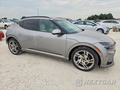 Czwarte zdjęcie samochodu z boku: 2024 GENESIS GV60 PERFORMANCE VIN:KMUKEDSB2RU022276 - miniatura