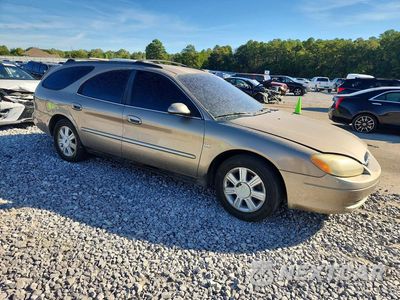 Czwarte zdjęcie samochodu z boku: 2003 FORD TAURUS SEL VIN:1FAHP59S33A196794 - miniatura
