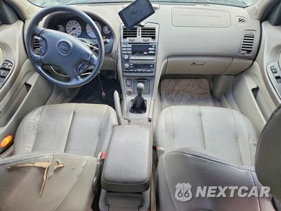 Zdjęcie 8 z 13 samochodu: 2001 NISSAN MAXIMA GXE VIN:JN1CA31A61T113215 - miniatura