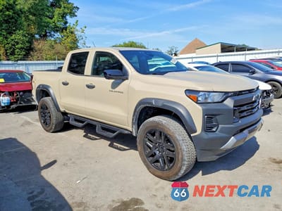 Czwarte zdjęcie samochodu z boku: 2024 CHEVROLET COLORADO TRAIL BOSS VIN:1GCPTEEK1R1140093 - miniatura