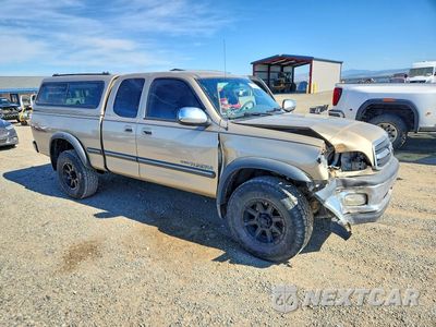 Czwarte zdjęcie samochodu z boku: 2002 TOYOTA TUNDRA SR5 V8 VIN:5TBBT44182S285369 - miniatura