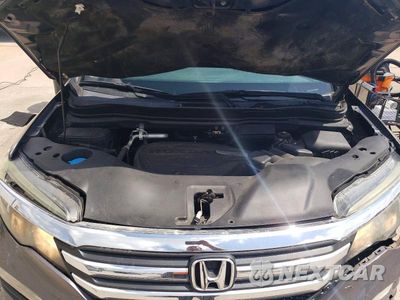 Zdjęcie 12 z 13 samochodu: 2018 HONDA PILOT EXL VIN:5FNYF5H56JB030444 - miniatura