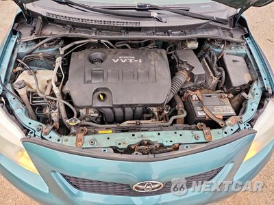 Zdjęcie 11 z 13 samochodu: 2010 TOYOTA COROLLA LE VIN:JTDBU4EE7A9110999 - miniatura