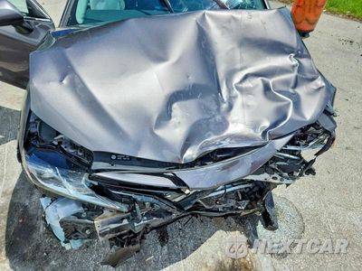 Zdjęcie 11 z 12 samochodu: 2022 TOYOTA CAMRY LE VIN:4T1C11AK0NU646652 - miniatura