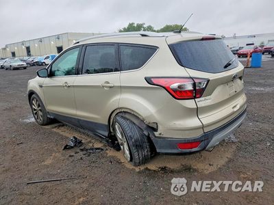 Drugie zdjęcie samochodu z przodu: 2017 FORD ESCAPE TITANIUM VIN:1FMCU9J95HUE76764 - miniatura