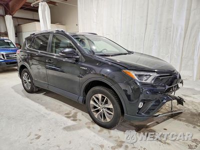 Czwarte zdjęcie samochodu z boku: 2017 TOYOTA RAV4 HYBRID XLE VIN:JTMRJREVXHD069733 - miniatura