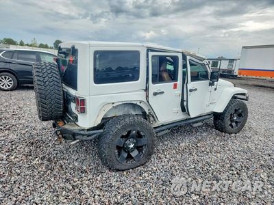 Trzecie zdjęcie samochodu z tyłu: 2015 JEEP WRANGLER UNLIMITED SAHARA VIN:1C4BJWEG0FL545444 - miniatura