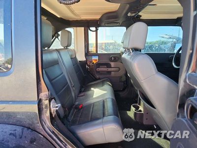 Zdjęcie 10 z 12 samochodu: 2010 JEEP WRANGLER UNLIMITED RUBICON VIN:1J4BA6H14AL166988 - miniatura