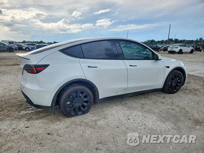 Trzecie zdjęcie samochodu z tyłu: 2023 TESLA MODEL Y VIN:7SAYGDEE6PF854161 - miniatura