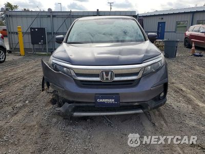 Piąte zdjęcie samochodu w środku: 2021 HONDA PILOT EX VIN:5FNYF6H30MB085836 - miniatura