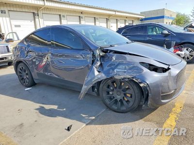 Czwarte zdjęcie samochodu z boku: 2022 TESLA MODEL Y VIN:7SAYGDEE2NF481391 - miniatura