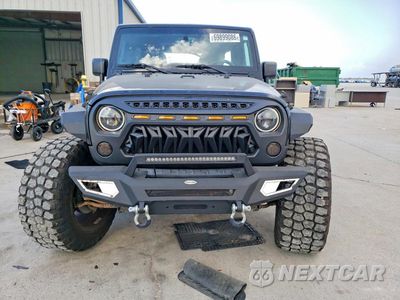 Piąte zdjęcie samochodu w środku: 2017 JEEP WRANGLER UNLIMITED SPORT VIN:1C4BJWDGXHL714664 - miniatura