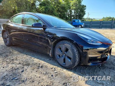 Czwarte zdjęcie samochodu z boku: 2021 TESLA MODEL 3 VIN:5YJ3E1EB1MF918135 - miniatura