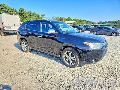 Czwarte zdjęcie samochodu z boku: 2014 MITSUBISHI OUTLANDER SE VIN:JA4AD3A37EZ010010 - miniatura