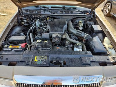 Zdjęcie 11 z 12 samochodu: 2004 MERCURY GRAND MARQUIS LS VIN:2MEFM75W14X630040 - miniatura