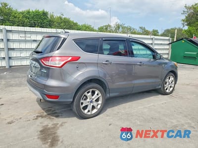 Trzecie zdjęcie samochodu z tyłu: 2013 FORD ESCAPE SEL VIN:1FMCU0HX2DUC99259 - miniatura