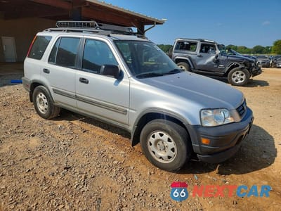 Czwarte zdjęcie samochodu z boku: 1999 HONDA CR-V LX VIN:JHLRD1843XC083752 - miniatura
