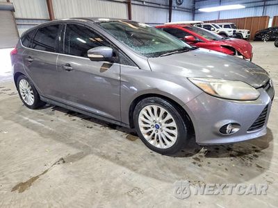 Czwarte zdjęcie samochodu z boku: 2012 FORD FOCUS TITANIUM VIN:1FAHP3N27CL444561 - miniatura