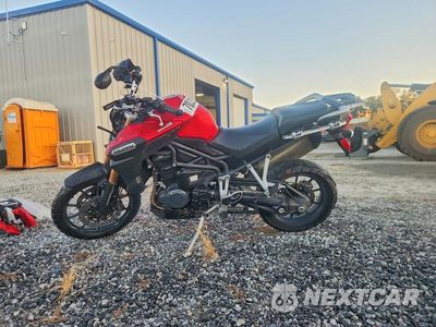 Trzecie zdjęcie samochodu z tyłu: 2015 TRIUMPH MOTORCYCLE TIGER EXPLORER VIN:SMTF02XK0FJ666325 - miniatura