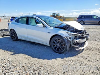 Czwarte zdjęcie samochodu z boku: 2018 TESLA MODEL 3 VIN:5YJ3E1EB7JF134716 - miniatura