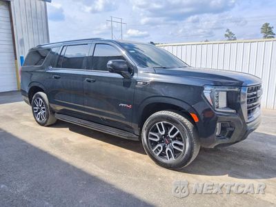Czwarte zdjęcie samochodu z boku: 2024 GMC YUKON XL K1500 AT4 VIN:1GKS2HKL6RR249179 - miniatura