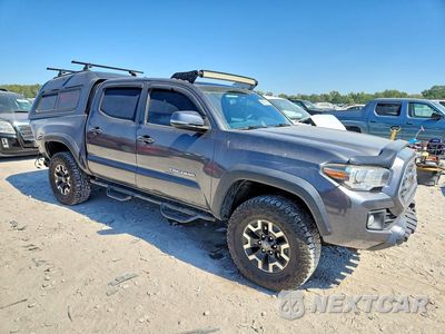 Czwarte zdjęcie samochodu z boku: 2017 TOYOTA TACOMA TRD OFF-ROAD VIN:3TMCZ5AN9HM097654 - miniatura