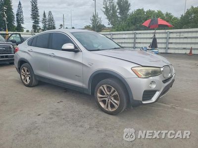 Czwarte zdjęcie samochodu z boku: 2016 BMW X4 XDRIVE28I VIN:5UXXW3C51G0R22470 - miniatura