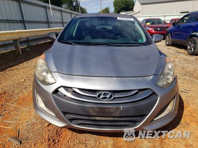 Piąte zdjęcie samochodu w środku: 2013 HYUNDAI ELANTRA GT BASE VIN:KMHD35LE2DU077007 - miniatura