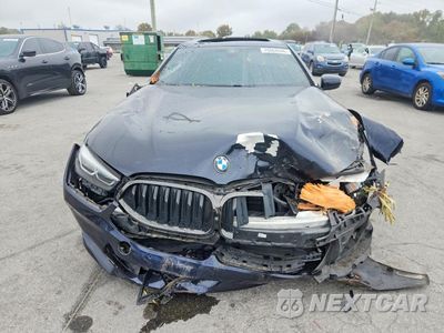 Piąte zdjęcie samochodu w środku: 2022 BMW M850XI VIN:WBAGV8C04NCJ31512 - miniatura