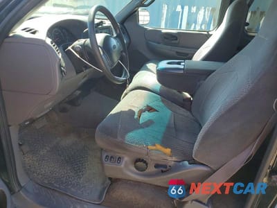 Zdjęcie 7 z 12 samochodu: 1999 FORD F150 VIN:1FTRX18LXXKB60506 - miniatura