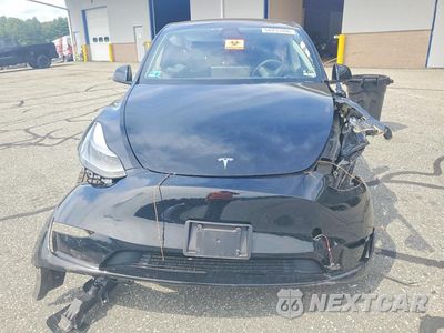 Piąte zdjęcie samochodu w środku: 2023 TESLA MODEL Y VIN:7SAYGAEE9PF847526 - miniatura