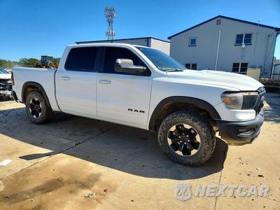 Czwarte zdjęcie samochodu z boku: 2020 RAM 1500 REBEL VIN:1C6RRELT9LN303566 - miniatura