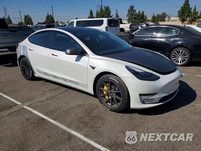 Czwarte zdjęcie samochodu z boku: 2022 TESLA MODEL 3 VIN:5YJ3E1EB4NF196466 - miniatura