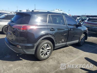 Trzecie zdjęcie samochodu z tyłu: 2017 TOYOTA RAV4 HYBRID XLE VIN:JTMRJREV3HD147687 - miniatura